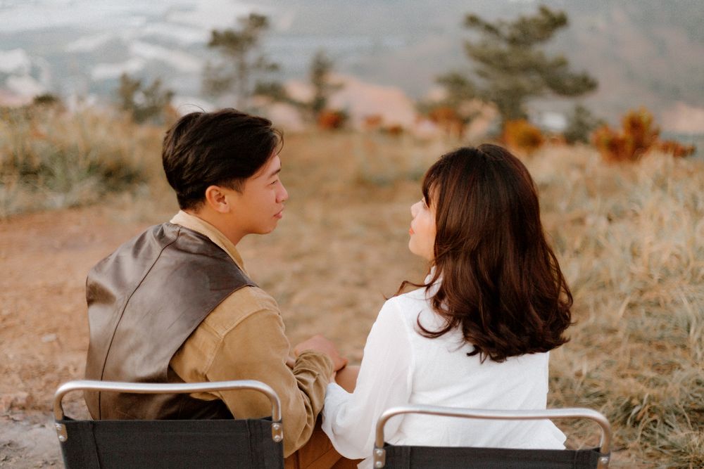 A couple enjoying a quiet moment together in nature